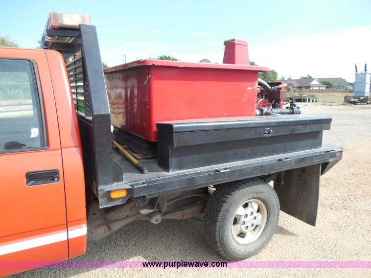 image for item I3311 1988 Chevrolet Silverado 1500 flatbed pickup truck