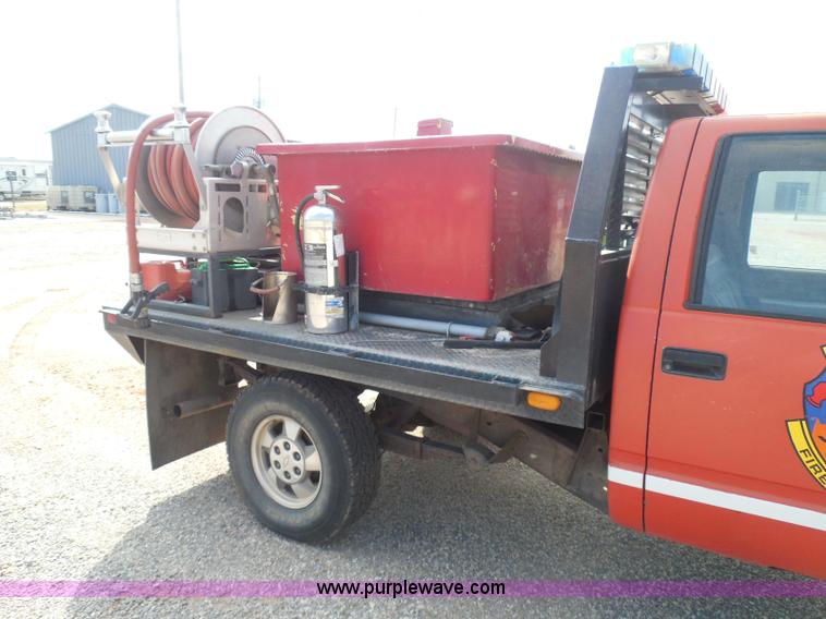 image for item I3311 1988 Chevrolet Silverado 1500 flatbed pickup truck