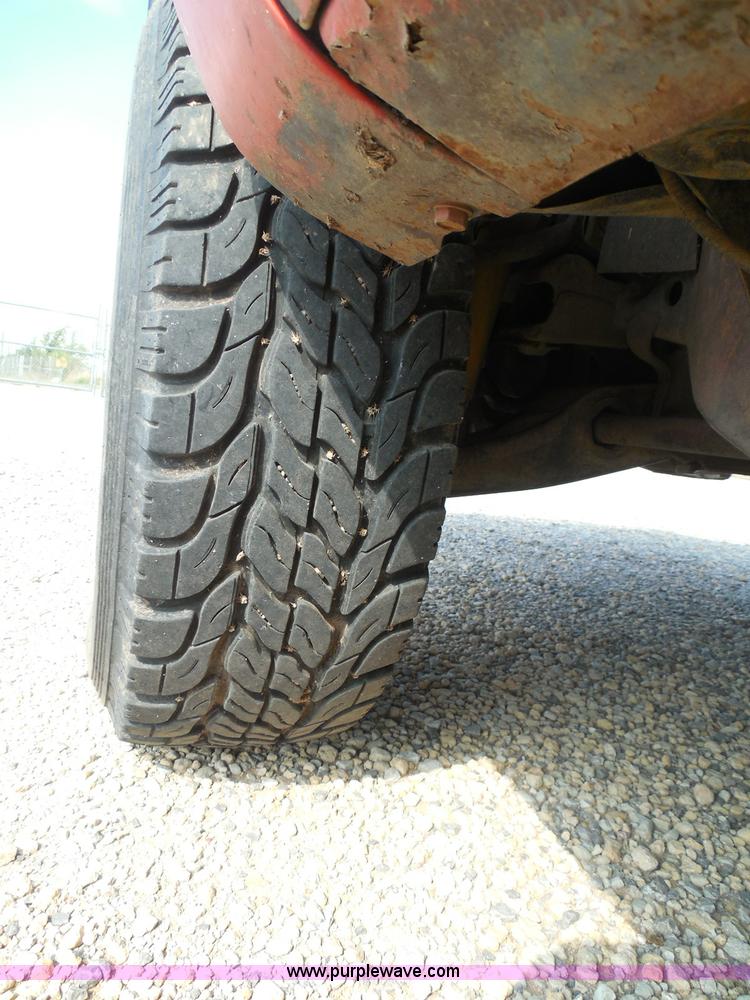 image for item I3311 1988 Chevrolet Silverado 1500 flatbed pickup truck