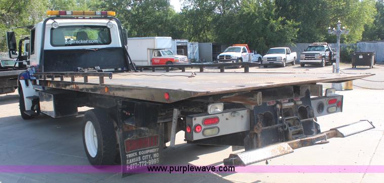 image for item J2244 2004 International DuraStar 4300 rollback truck