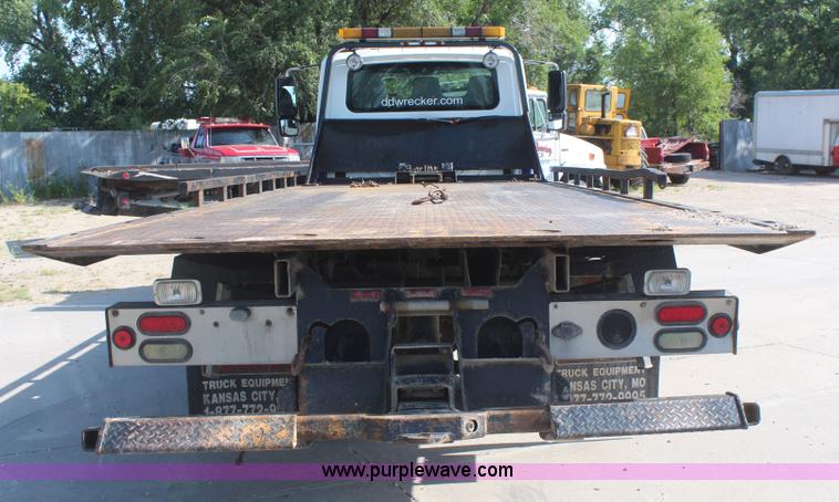 image for item J2244 2004 International DuraStar 4300 rollback truck