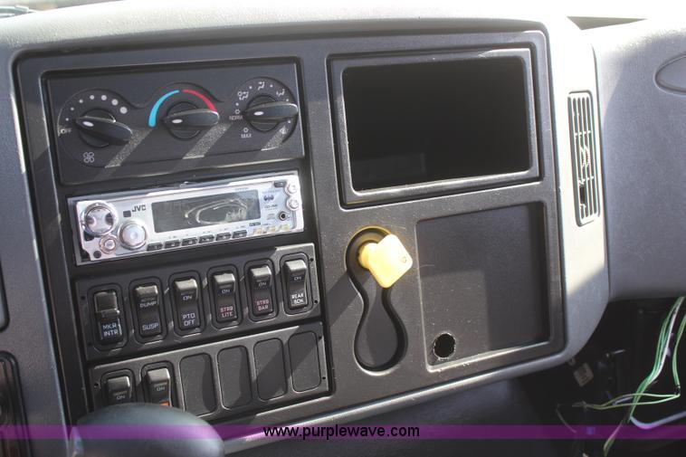 image for item J2244 2004 International DuraStar 4300 rollback truck