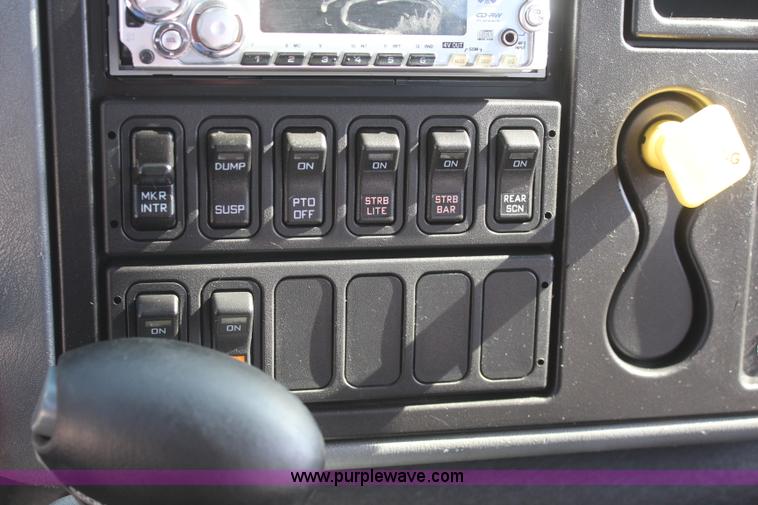 image for item J2244 2004 International DuraStar 4300 rollback truck