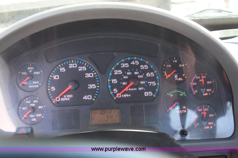 image for item J2244 2004 International DuraStar 4300 rollback truck