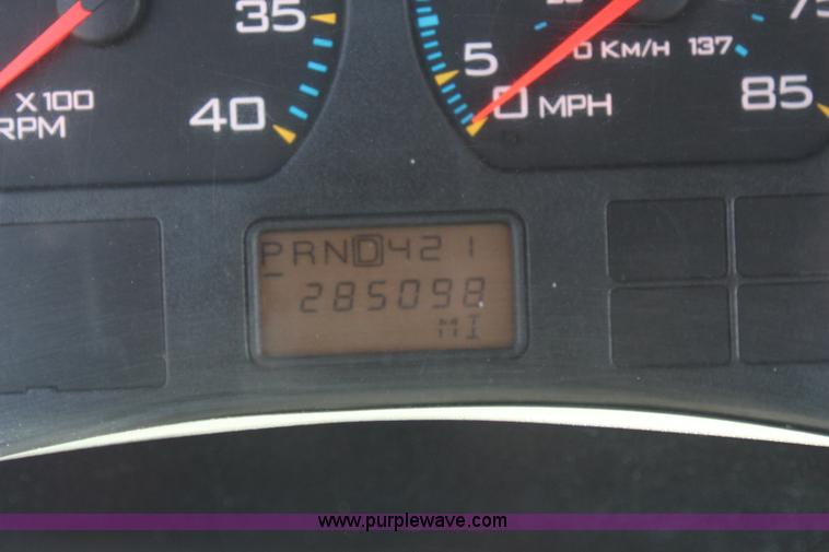 image for item J2244 2004 International DuraStar 4300 rollback truck