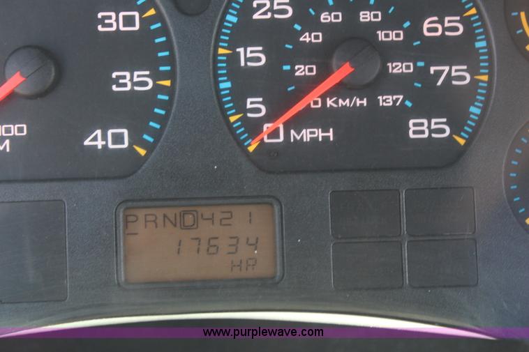 image for item J2244 2004 International DuraStar 4300 rollback truck