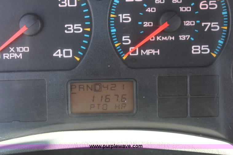 image for item J2244 2004 International DuraStar 4300 rollback truck