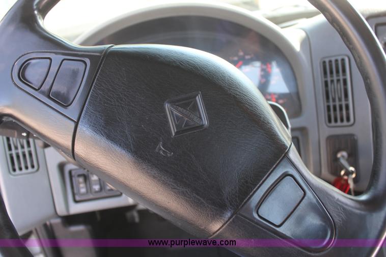 image for item J2244 2004 International DuraStar 4300 rollback truck