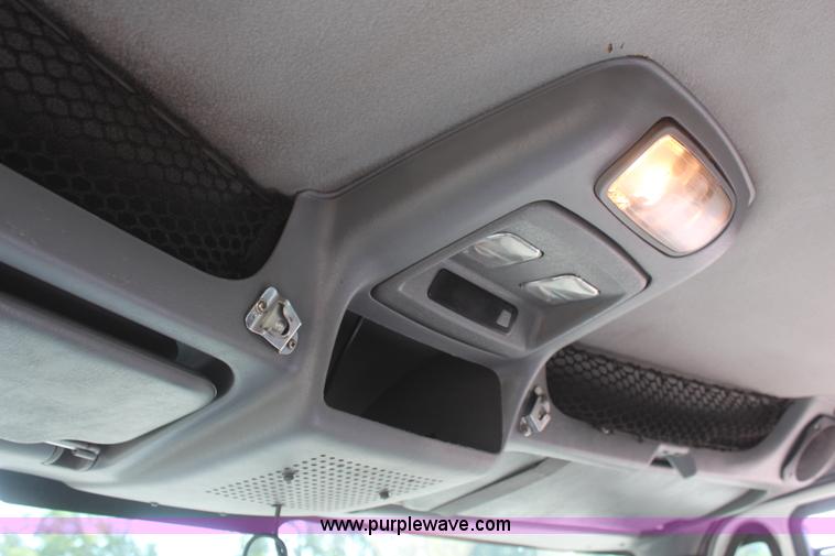 image for item J2244 2004 International DuraStar 4300 rollback truck