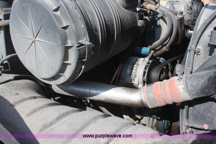 image for item J2244 2004 International DuraStar 4300 rollback truck