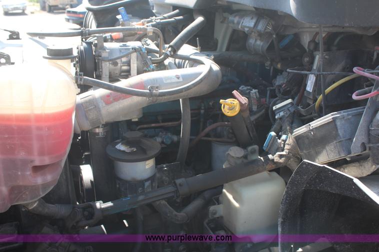 image for item J2244 2004 International DuraStar 4300 rollback truck