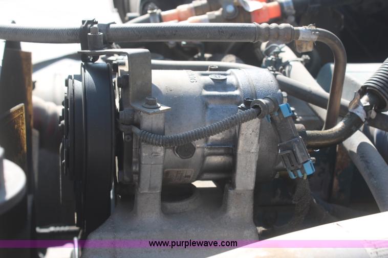 image for item J2244 2004 International DuraStar 4300 rollback truck