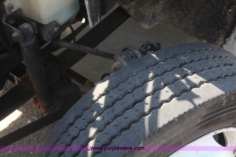 image for item J2244 2004 International DuraStar 4300 rollback truck