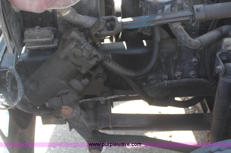 image for item J2244 2004 International DuraStar 4300 rollback truck