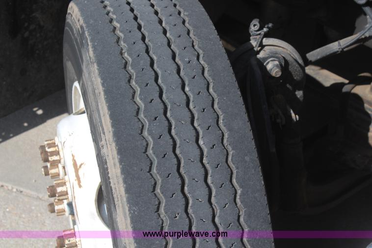 image for item J2244 2004 International DuraStar 4300 rollback truck