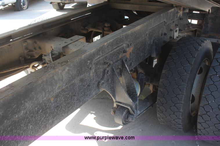 image for item J2244 2004 International DuraStar 4300 rollback truck