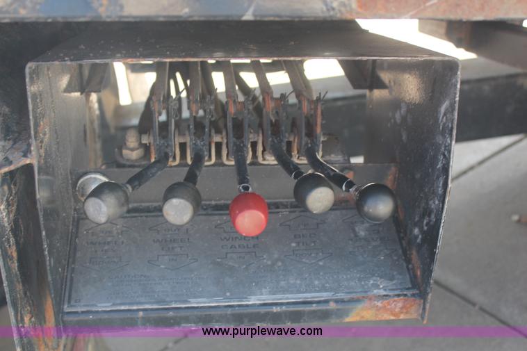 image for item J2244 2004 International DuraStar 4300 rollback truck