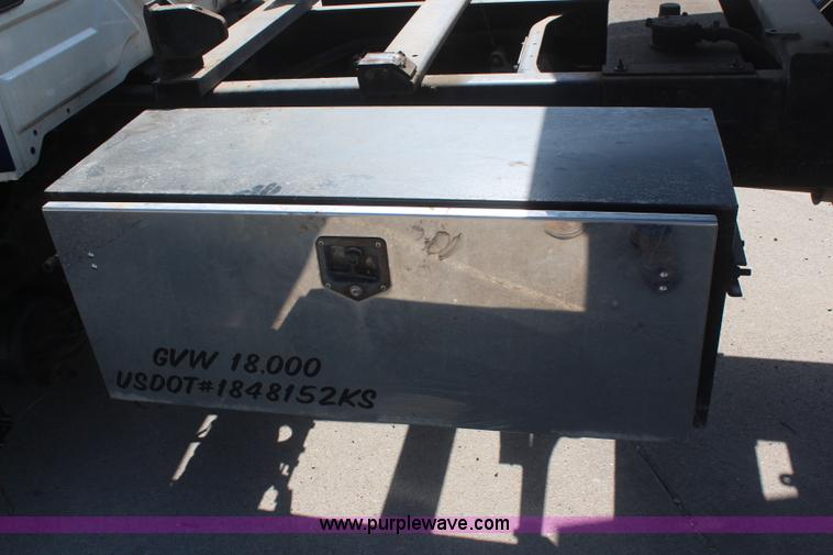 image for item J2244 2004 International DuraStar 4300 rollback truck