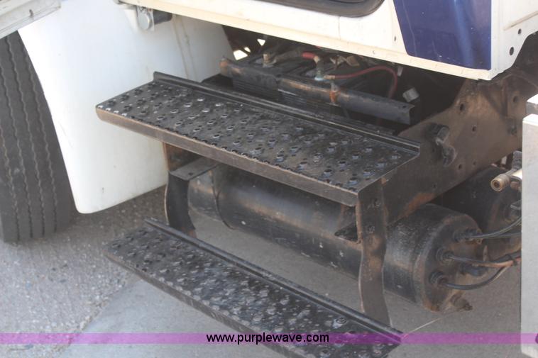 image for item J2244 2004 International DuraStar 4300 rollback truck