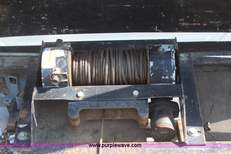 image for item J2244 2004 International DuraStar 4300 rollback truck