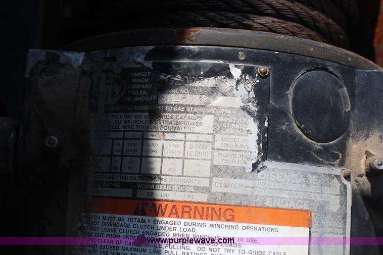 image for item J2244 2004 International DuraStar 4300 rollback truck