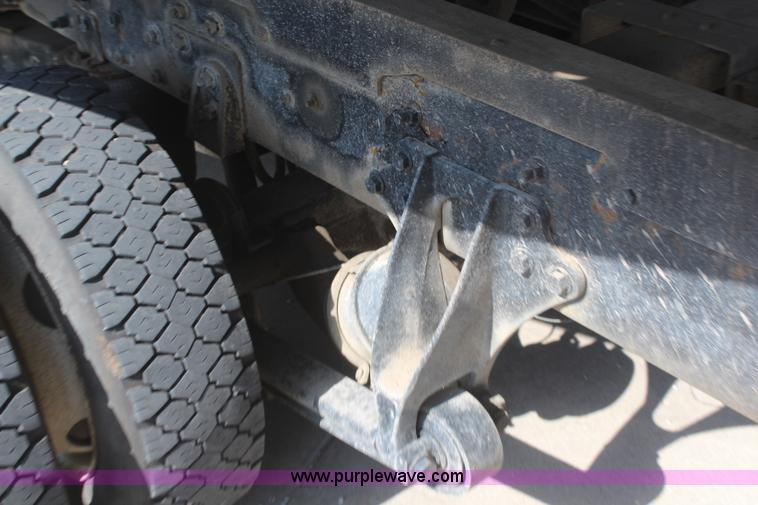 image for item J2244 2004 International DuraStar 4300 rollback truck