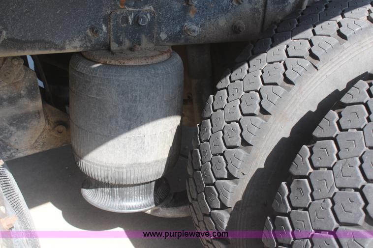 image for item J2244 2004 International DuraStar 4300 rollback truck