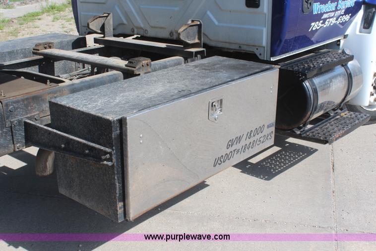 image for item J2244 2004 International DuraStar 4300 rollback truck