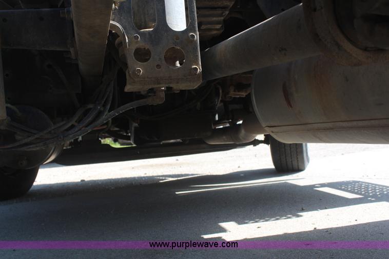 image for item J2244 2004 International DuraStar 4300 rollback truck