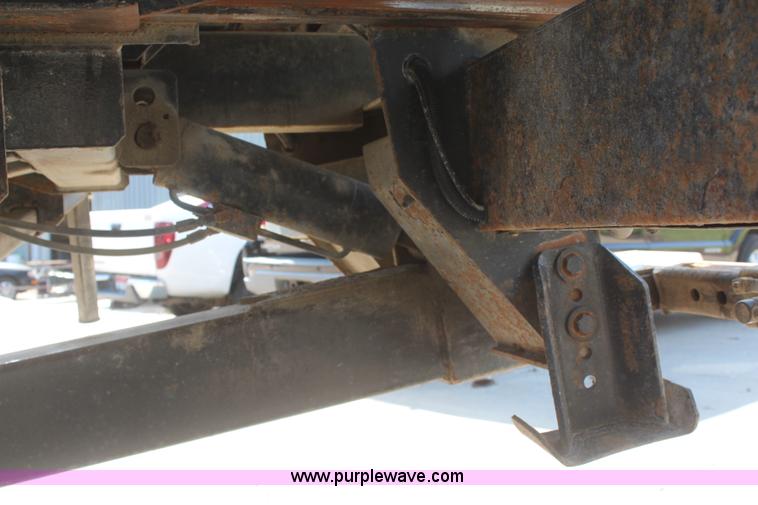 image for item J2244 2004 International DuraStar 4300 rollback truck