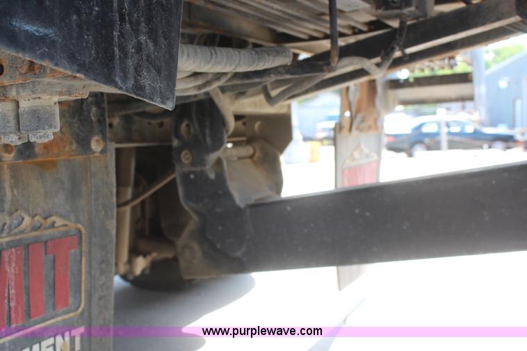 image for item J2244 2004 International DuraStar 4300 rollback truck