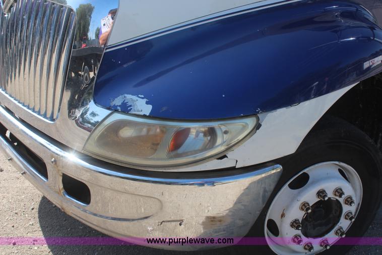 image for item J2244 2004 International DuraStar 4300 rollback truck