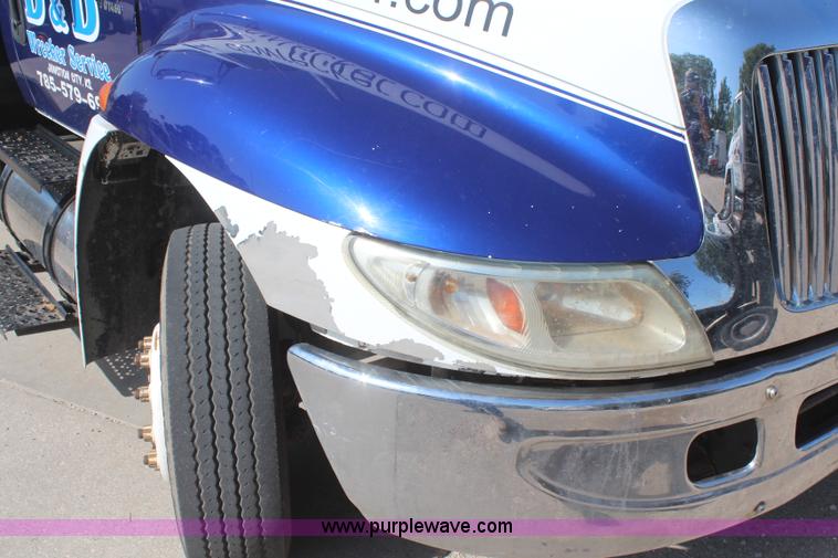 image for item J2244 2004 International DuraStar 4300 rollback truck