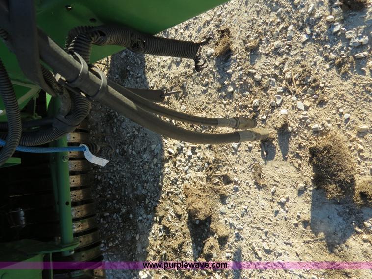 image for item B4822 2004 John Deere 467 round baler