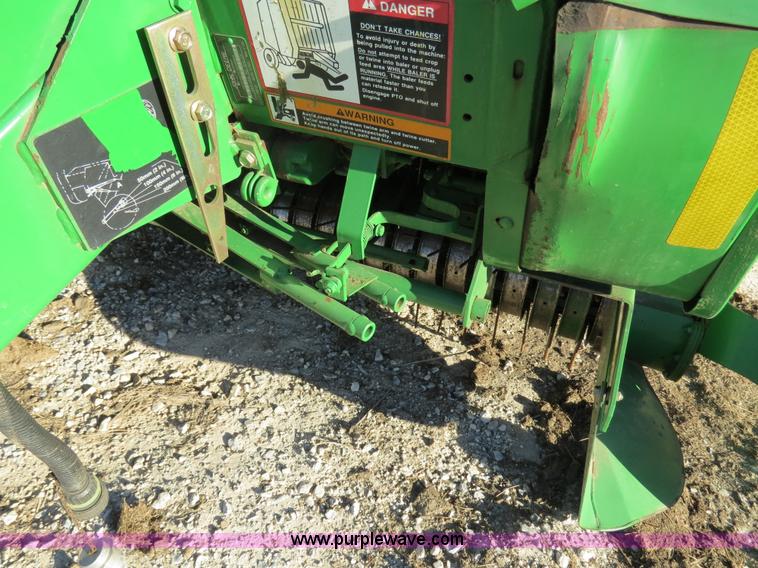 image for item B4822 2004 John Deere 467 round baler