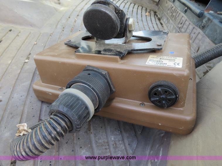 image for item B4822 2004 John Deere 467 round baler