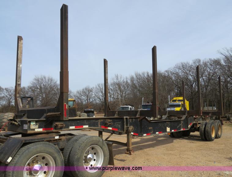 image for item B4848 2000 Sun Manufacturing, Inc. 4 Bolster Sun-Lite log trailer