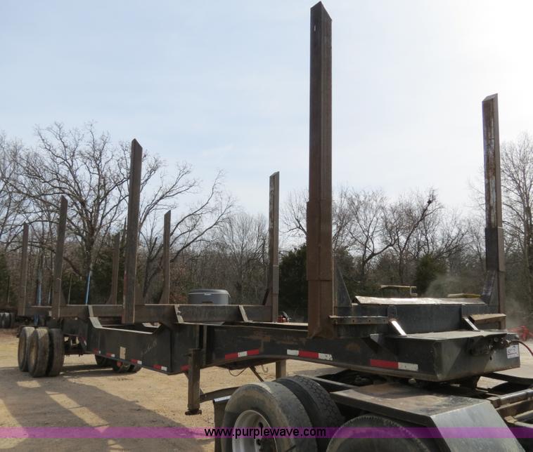 image for item B4848 2000 Sun Manufacturing, Inc. 4 Bolster Sun-Lite log trailer