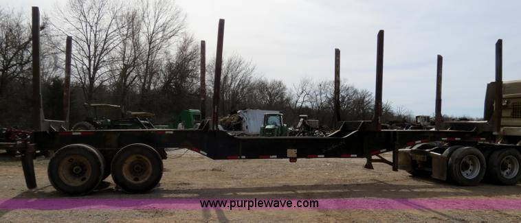image for item B4848 2000 Sun Manufacturing, Inc. 4 Bolster Sun-Lite log trailer