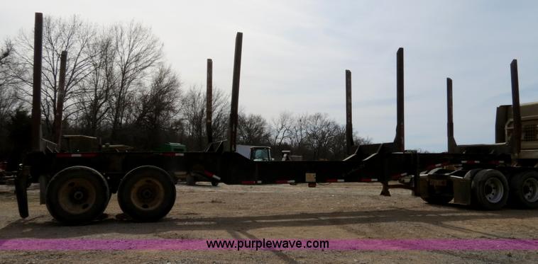 image for item B4848 2000 Sun Manufacturing, Inc. 4 Bolster Sun-Lite log trailer