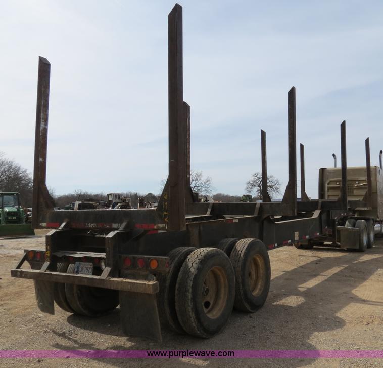 image for item B4848 2000 Sun Manufacturing, Inc. 4 Bolster Sun-Lite log trailer