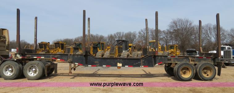 image for item B4848 2000 Sun Manufacturing, Inc. 4 Bolster Sun-Lite log trailer