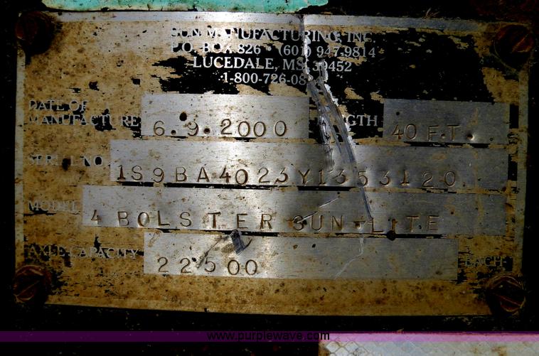 image for item B4848 2000 Sun Manufacturing, Inc. 4 Bolster Sun-Lite log trailer