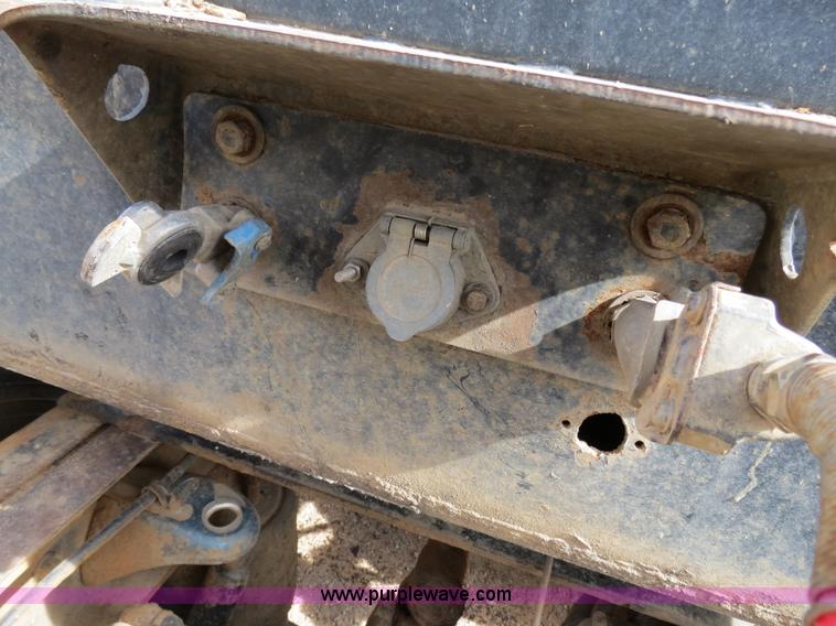 image for item B4848 2000 Sun Manufacturing, Inc. 4 Bolster Sun-Lite log trailer