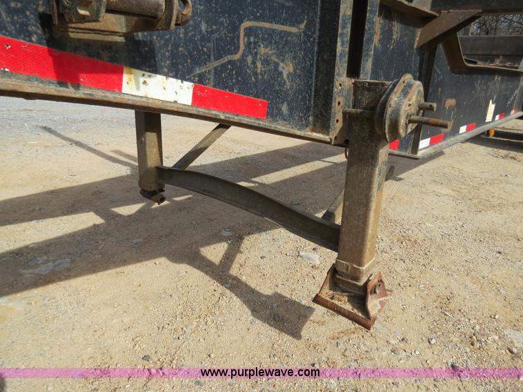 image for item B4848 2000 Sun Manufacturing, Inc. 4 Bolster Sun-Lite log trailer