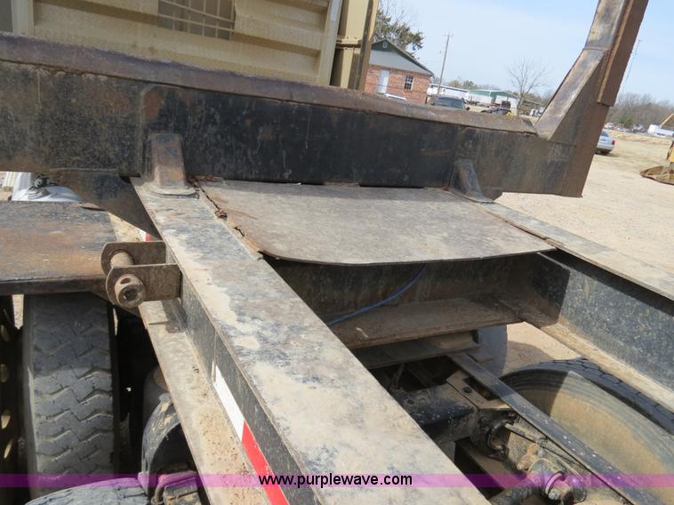 image for item B4848 2000 Sun Manufacturing, Inc. 4 Bolster Sun-Lite log trailer