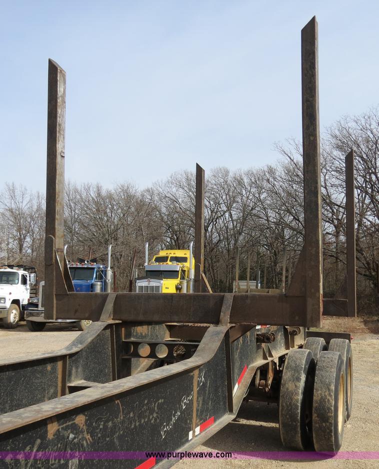 image for item B4848 2000 Sun Manufacturing, Inc. 4 Bolster Sun-Lite log trailer