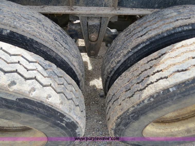 image for item B4848 2000 Sun Manufacturing, Inc. 4 Bolster Sun-Lite log trailer