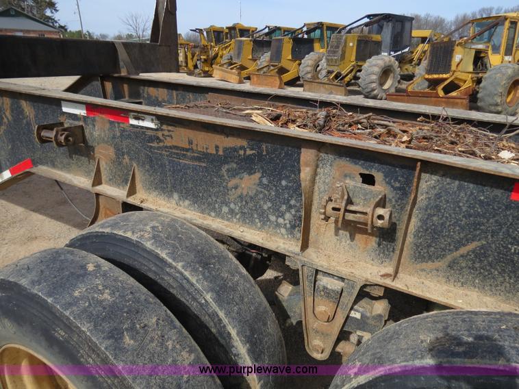 image for item B4848 2000 Sun Manufacturing, Inc. 4 Bolster Sun-Lite log trailer