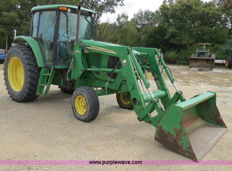 image for item B4864 2004 John Deere 6615 tractor